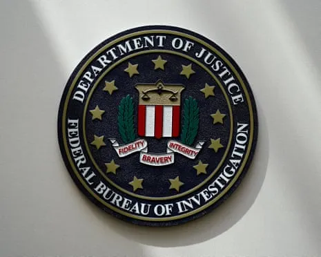 Suspect Sought Following Car Crashed into FBI Entrance in Potential ‘Act of Terror